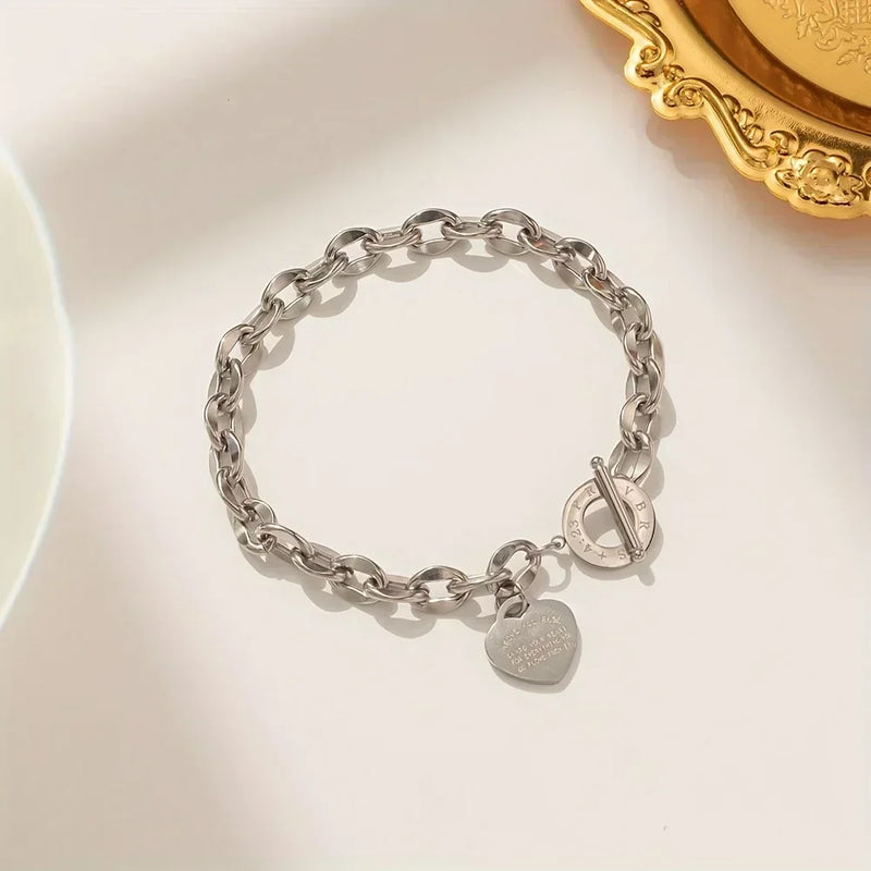 Bracelet en acier inoxydable avec pendentif double cœur
