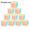 A 10-piece set of pink and blue stickerless speed cubes.