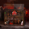 A wooden book nook kit featuring a spooky Halloween miniature shelf insert with red LED lights and gothic details.
