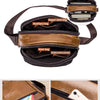 A brown leather crossbody bag showing a front multi-function zipper and a convenient rear zipper.