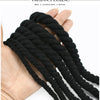 A hand is holding several strands of black natural twisted cotton cord.
