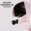Close-up of a pink umbrella tip showing the smooth anti-puncture design.