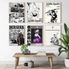 A collection of four minimalist anime canvas wall art posters featuring various characters and dramatic artwork.