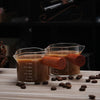 Vasitos de cristal transparente para espresso con asas de madera