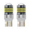 A pair of LED turn signal and reverse light bulbs with clear glass lenses and silver bases.