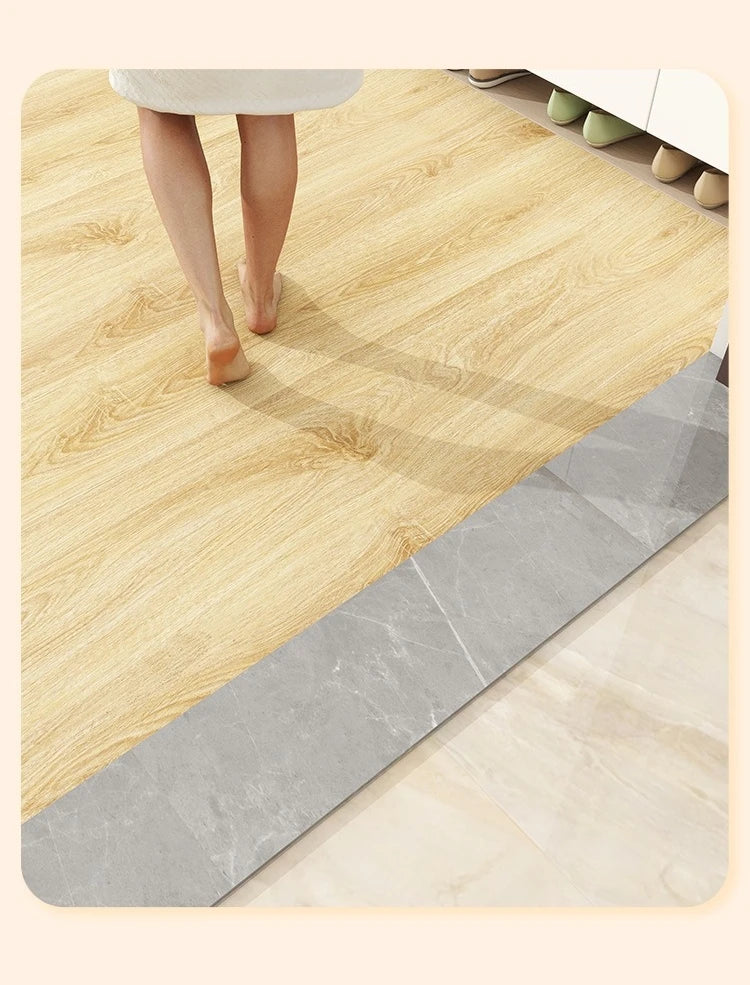 A close-up view of a light wood grain floor sticker being applied to a surface, showing the peel-and-stick texture.