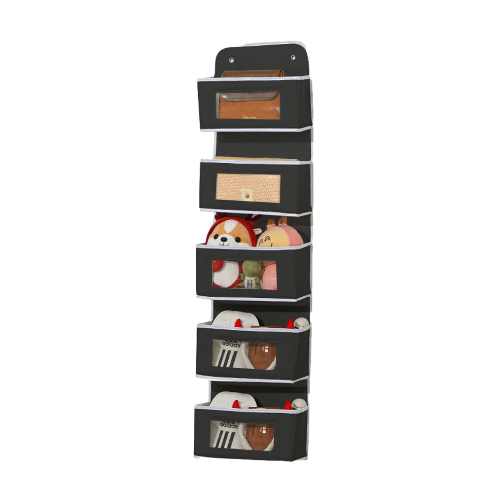 A vertical organizer rack with multiple compartments for hanging small items like keys, coins, and accessories.