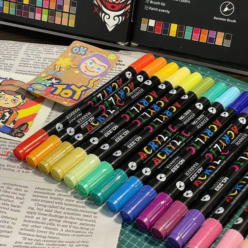 A collection of dual-tip acrylic paint markers showing various vibrant colors and tips for art and craft.