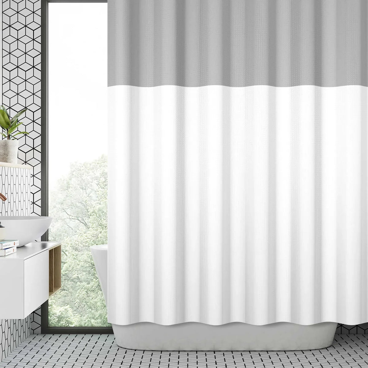 A shower curtain featuring a two-tone geometric stripe pattern of gray and white.
