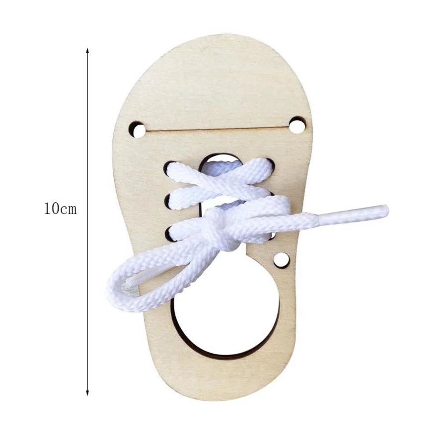 A wooden Montessori busy board with a loop for lacing and a string attached.
