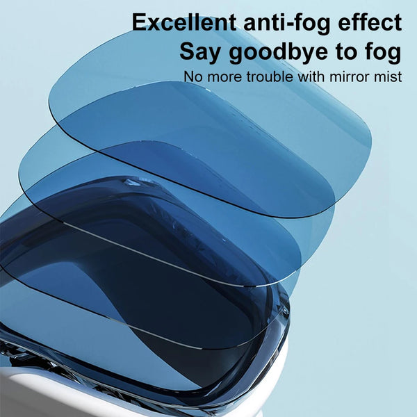 A close-up view of blue swimming goggles with a silicone seal, demonstrating an anti-fog effect.