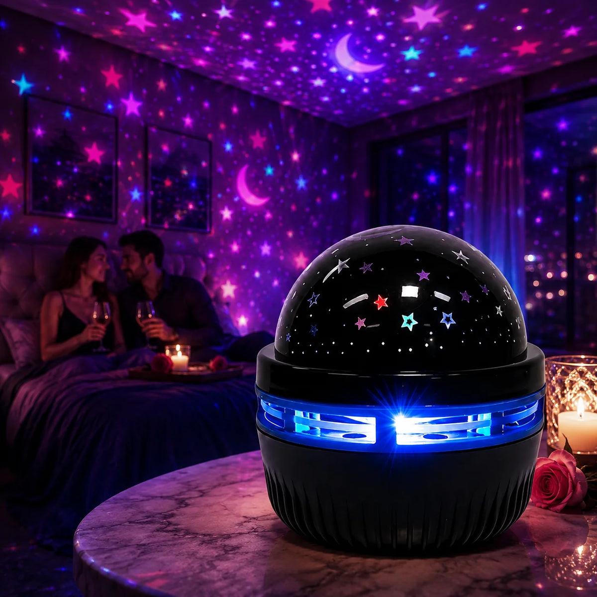 A black spherical projector light emitting a blue glow rests on a marble surface in a dimly lit room with purple starry light
