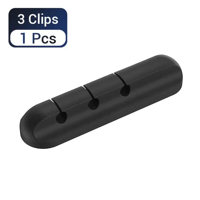 Black silicone cable organizer and winder with three clips for cable management