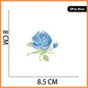 Blue rose embroidery patch with green stem and leaves