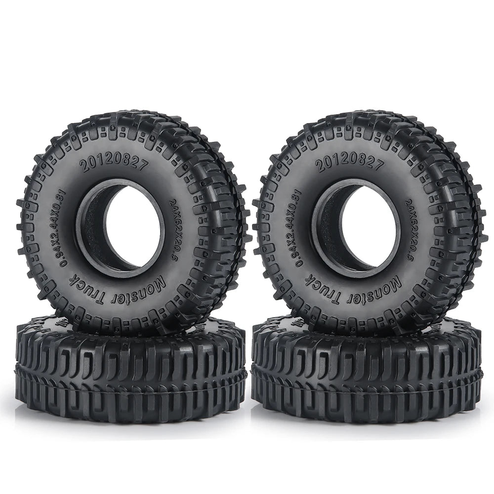 A pair of black rubber mud terrain tires for Axial SCX24 and TRX4M vehicles.