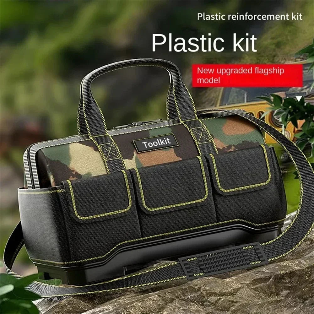 A black and olive camouflage plastic kit tool bag with a reinforced base is shown outdoors.