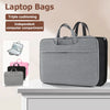 A gray laptop bag with black trim is shown on a white surface, highlighting triple cushioning and an independent computer com