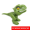 A green plastic dinosaur toy resembling a Triceratops or Tyrannosaurus, shown in a close-up view.