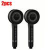 A pair of black high-pressure handheld shower heads with silicone nozzles.