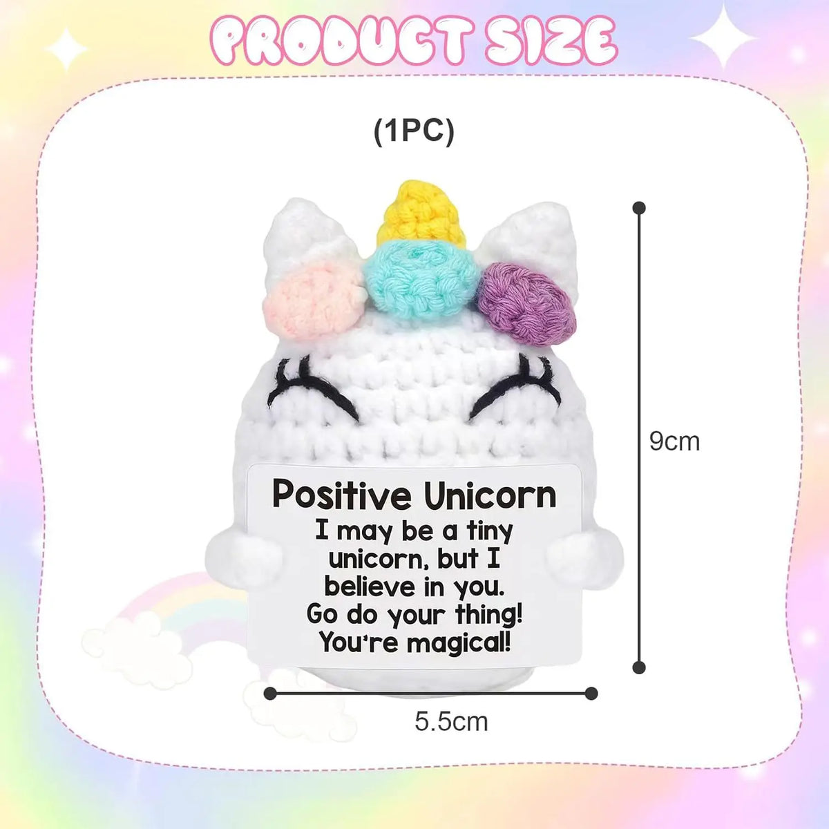 A white crocheted unicorn doll with a yellow horn and pink ears, featuring a positive unicorn message.