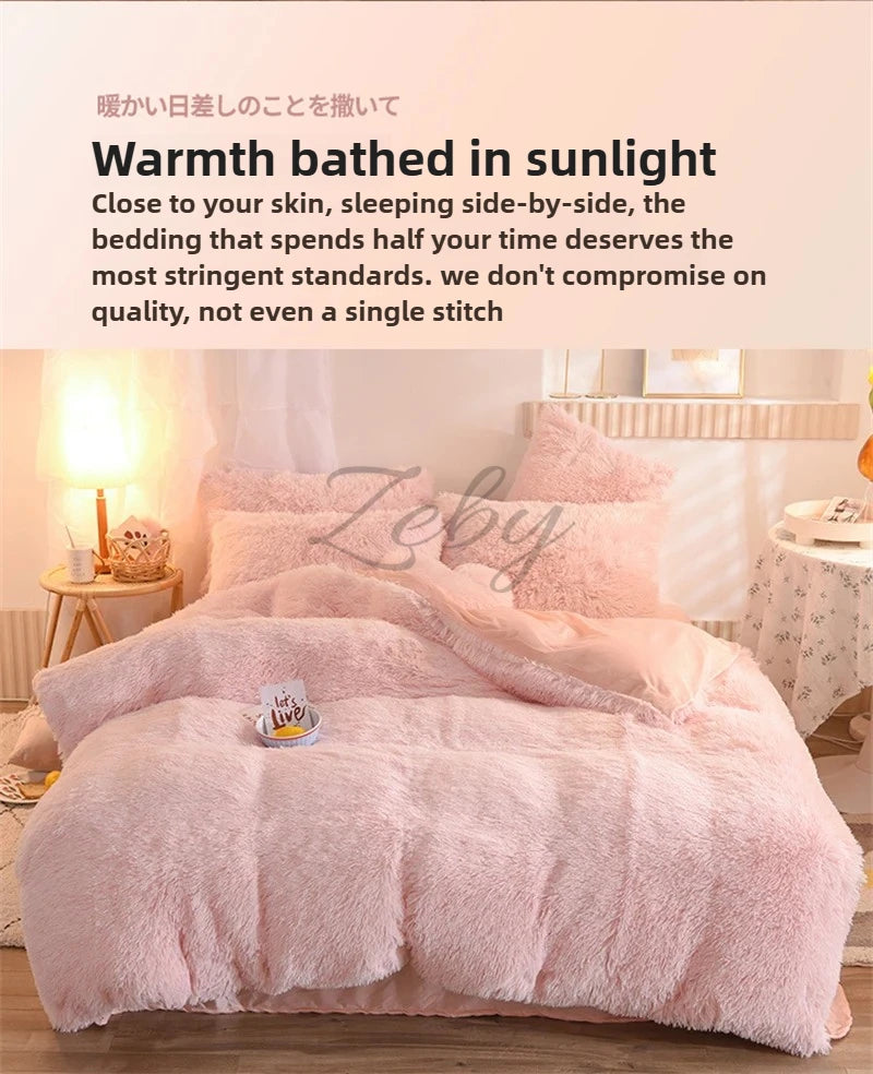 A pink plush mink velvet duvet cover set displayed on a bed with soft lighting.