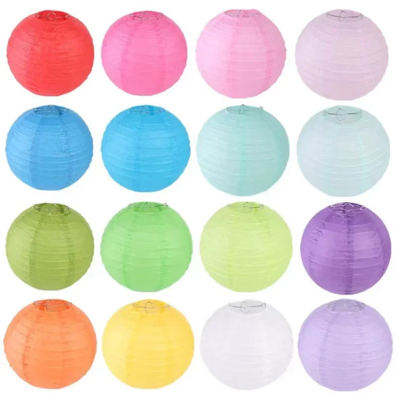 A collection of colorful round paper lanterns in various shades including red, pink, blue, green, and purple.