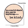 A circular patch with embroidered text that reads in a world where you can be anything be kind