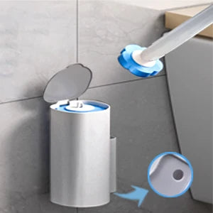 A disposable toilet brush set with a wall-mount holder and refill pads is shown next to a tiled wall.