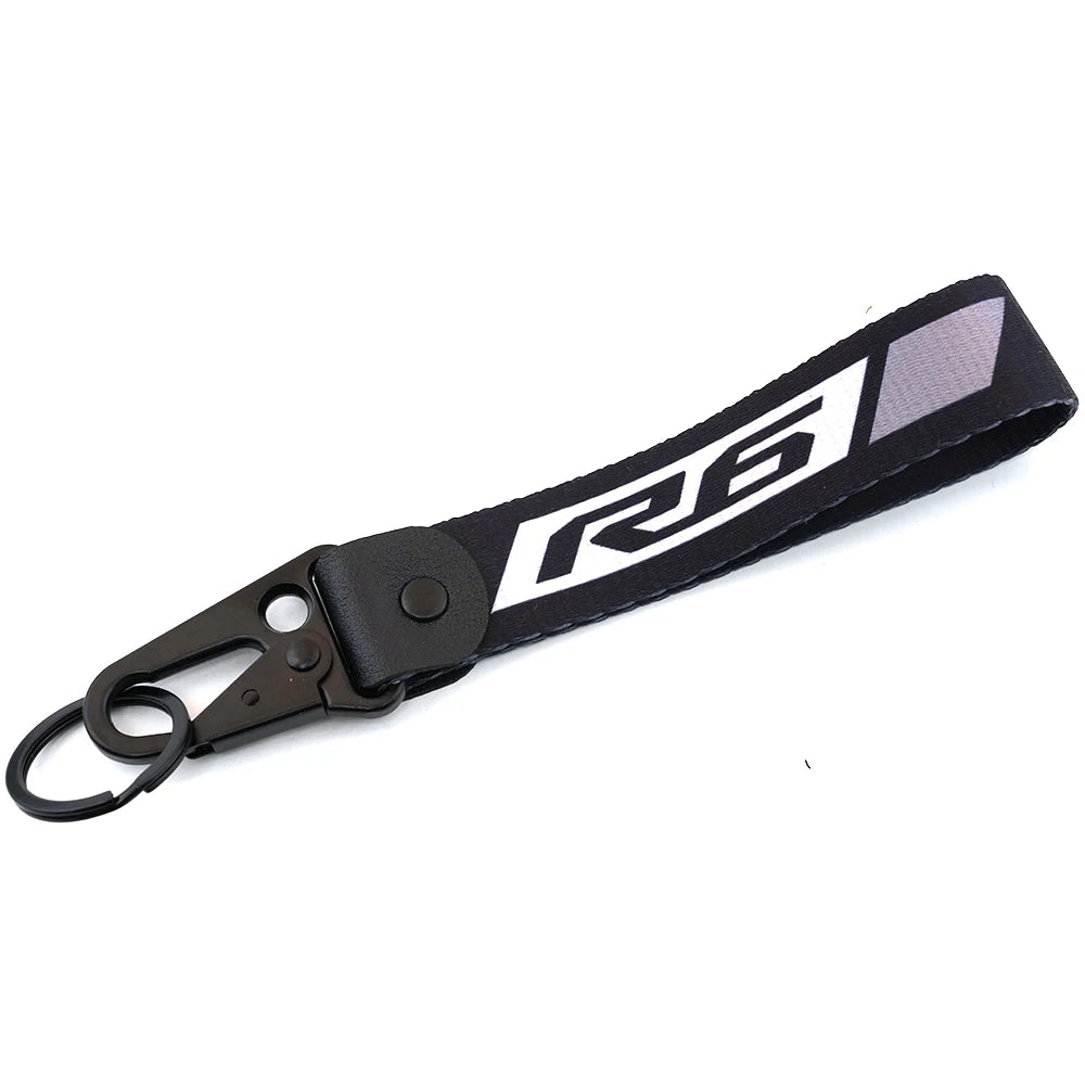 Black brake fluid reservoir cover sock for Yamaha R1 R6 motorcycle.