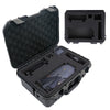 A black rugged waterproof hard case with an open lid showing a foam insert and accessories.