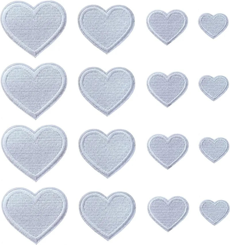 A collection of twenty-four heart-shaped iron-on patches in light blue embroidery.