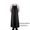 Black PU leather waterproof apron worn by a person, showing the size 42.5 inch by 26 inch.