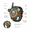 A camouflage watch set with an antenna, compass, and digital display is shown with various features labeled.