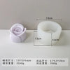 A white silicone mold shaped like a rose or peony, used for making candles, soap, and baking crafts.