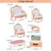 A living room set featuring a sofa, chair, and table for dollhouse furniture play.