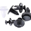 A set of black auto trim panel retainer clips and fasteners for secure body panel repair.