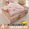 A lightweight summer quilt with a pink and white checkered pattern featuring playful cartoon prints.