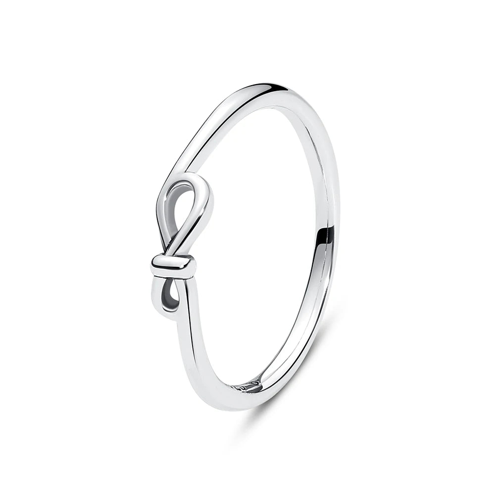 A sterling silver heart ring with a cubic zirconia stone shown against a white background.