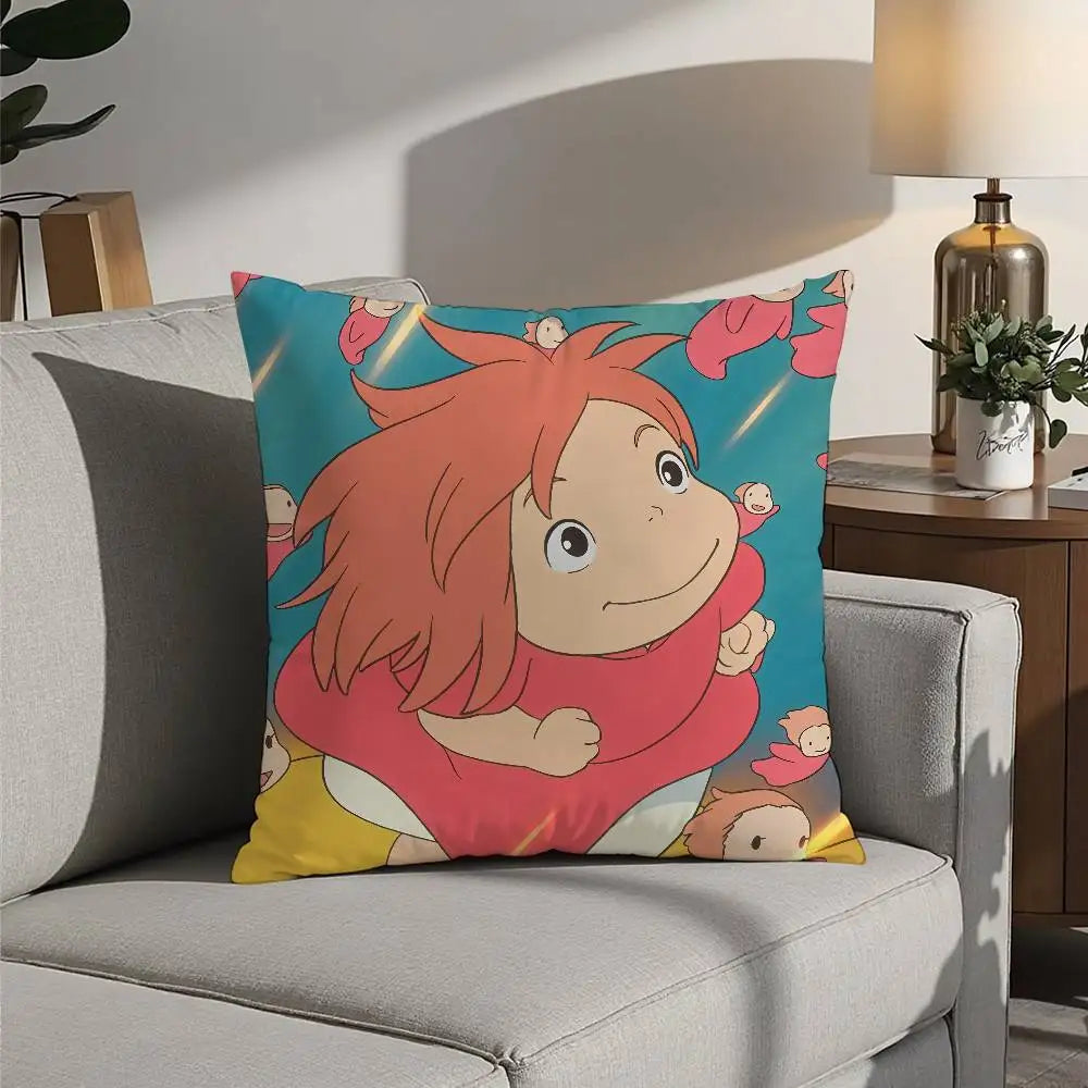 A colorful cartoon pillow featuring a pink-haired character inspired by Ponyo, displayed on a gray sofa.