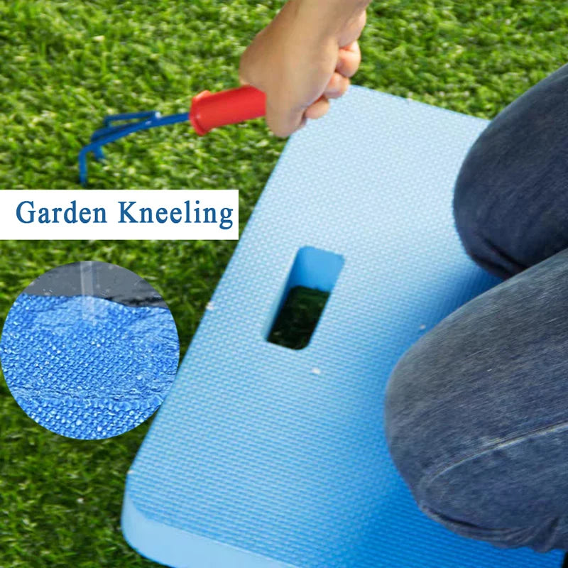 A hand is using a red handle to operate a blue foam kneeling pad for garden kneeling.