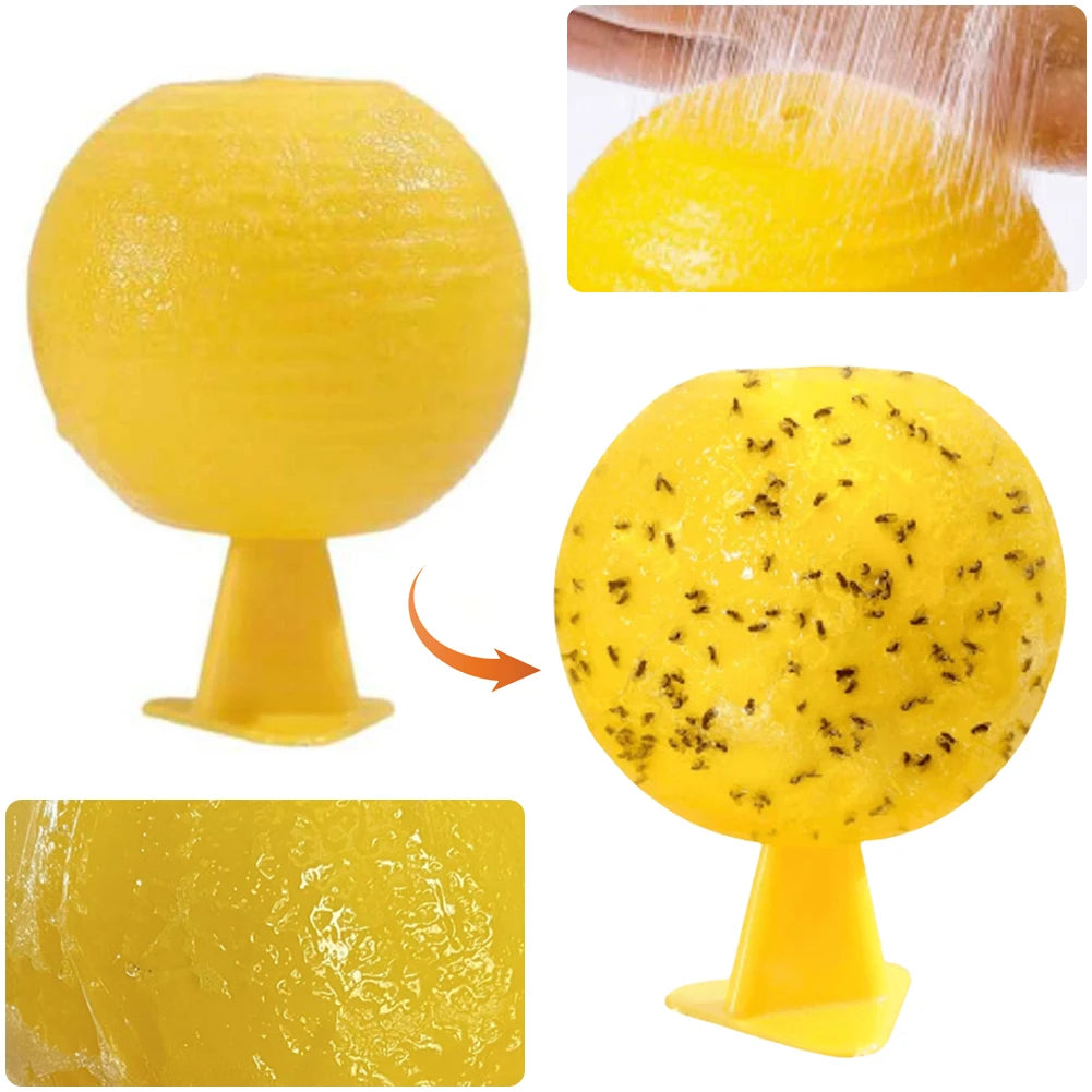 A yellow sticky fruit fly trap ball with a stem, showing its texture and use for pest control.