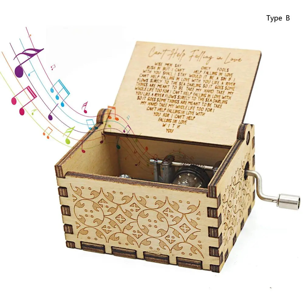 A vintage hand-cranked wooden music box plays the song Can't Help Falling in Love, featuring a carved wooden box and a metal 