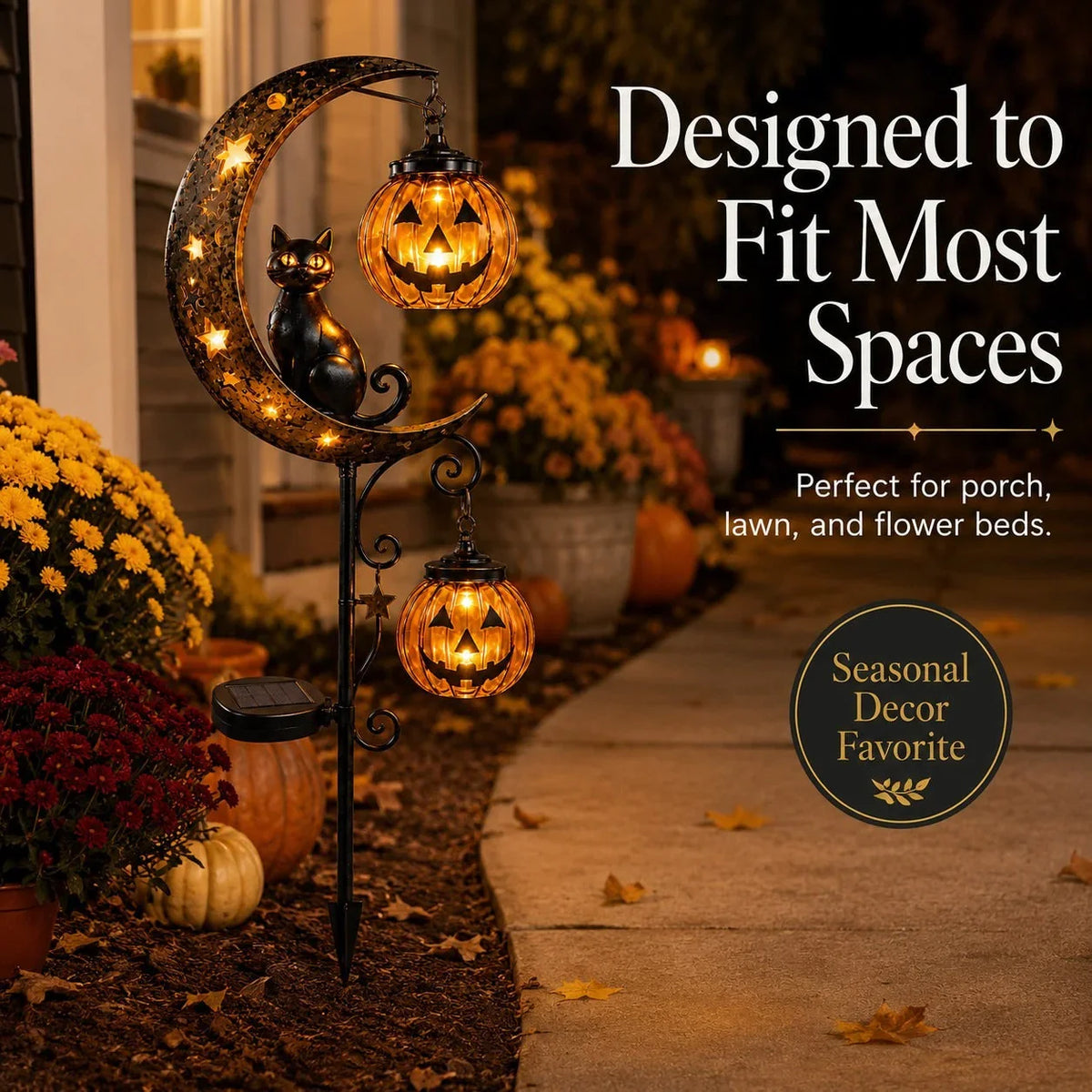 A black cat and pumpkin garden stake light shaped like a crescent moon, illuminating a pathway.