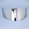 A reflective silver motorcycle helmet visor lens shield displayed against a light blue background.