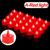 A close-up view of multiple red heart-shaped flameless LED candles glowing brightly against a black background.