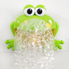 A bright green musical bubble maker bath toy with large eyes is shown pouring a stream of clear bubbles.