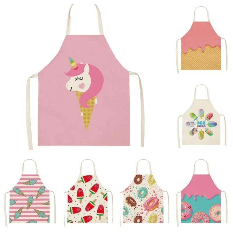 A set of colorful linen kitchen aprons featuring various patterns and pink, green, and yellow colors.