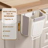 White with Gray foldable hanging trash bin mounted on a wooden cabinet