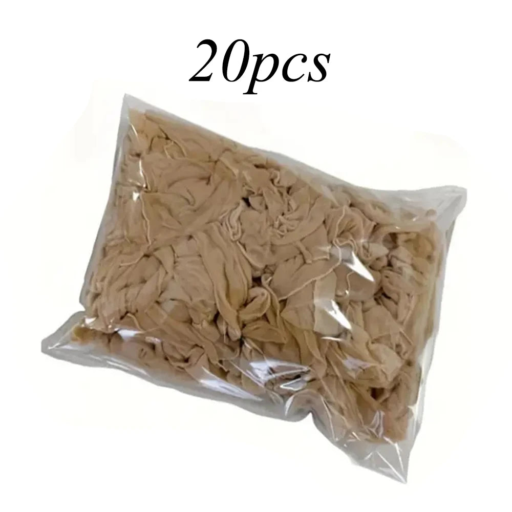 A plastic bag containing 20 pieces of ultra-thin invisible wig cap material.