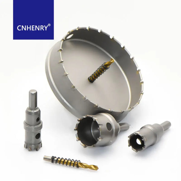 A kit for drilling holes featuring a metal disc, a pilot drill bit, and a separate drill bit.
